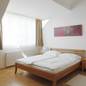 Premium Business Apartment Wien mit Terrasse - Typ Comfort Family - Apartment-Wien-Riess-Dachgeschoss57-Schlafzimmer.jpg